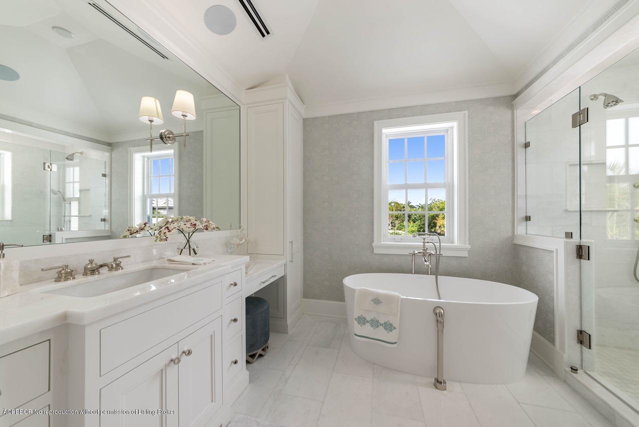 225 Arabian Road Palm Beach, FL 33480 - Photo 9 of 14 a spacious bathroom with a tub sink a mirror and a shower