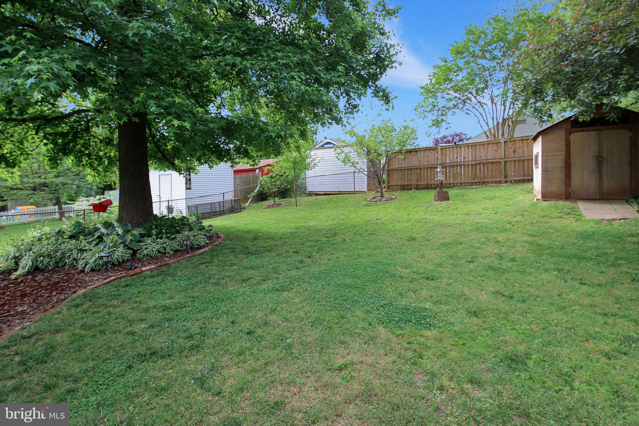 1514 Hanby Street Silver Spring, MD 20902 - Photo 4 of 39 Expansive yard with landscaping and shed.