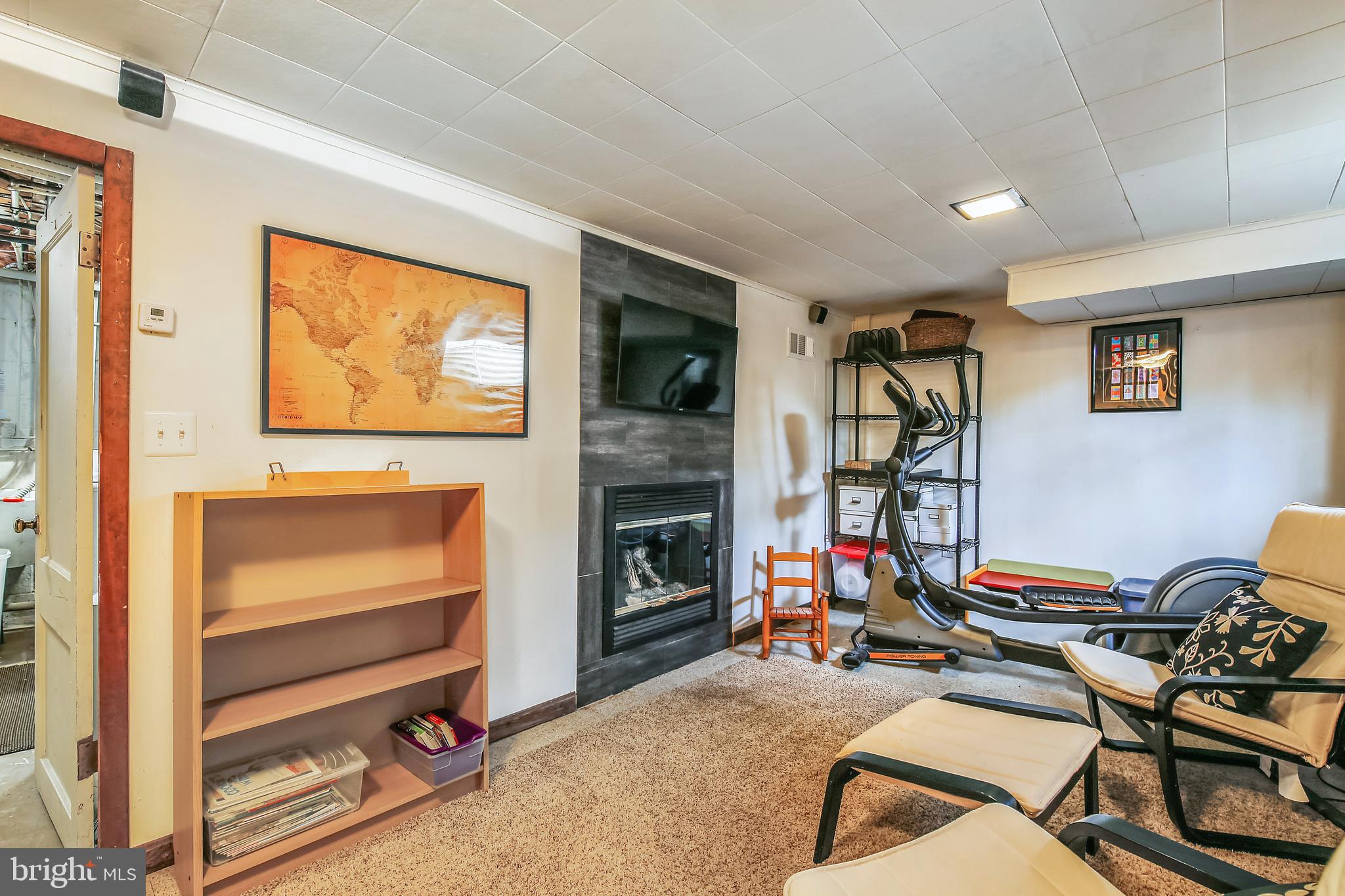 1514 Hanby Street Silver Spring, MD 20902 - Photo 35 of 39 Lower Level rec room with gas fireplace