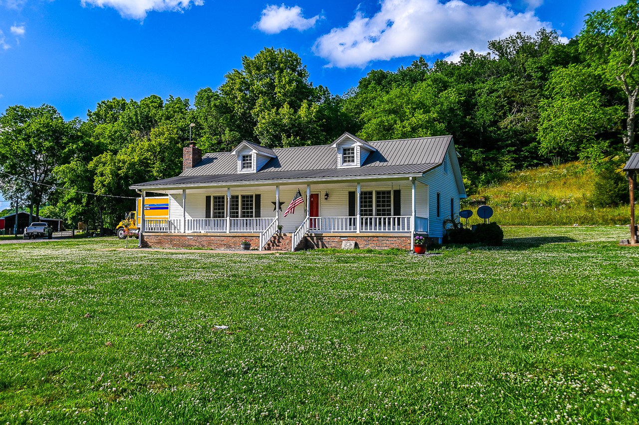 front view of a house with a big yard