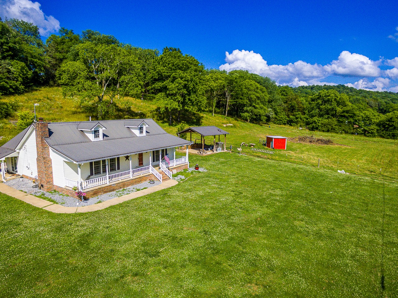 183 Lane Branch Road Fayetteville, TN 37334 - Photo 2 of 48 a aerial view of a house with a big yard