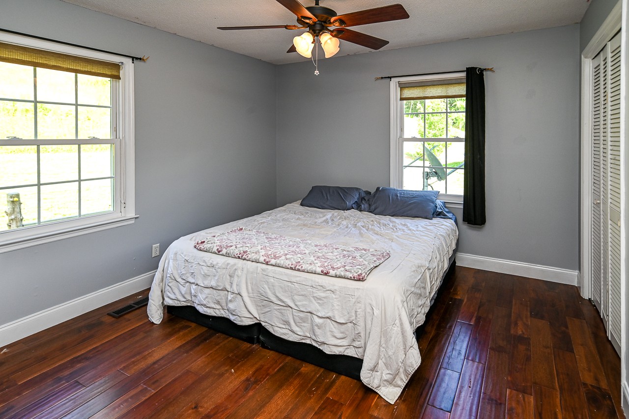 183 Lane Branch Road Fayetteville, TN 37334 - Photo 21 of 48 a bedroom with a bed and window