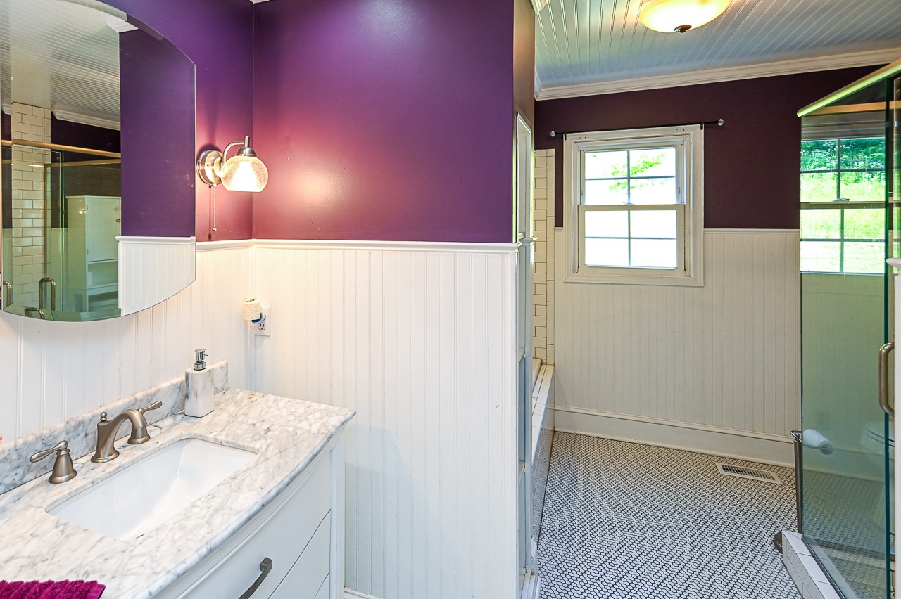 183 Lane Branch Road Fayetteville, TN 37334 - Photo 22 of 48 a bathroom with a sink vanity and a mirror