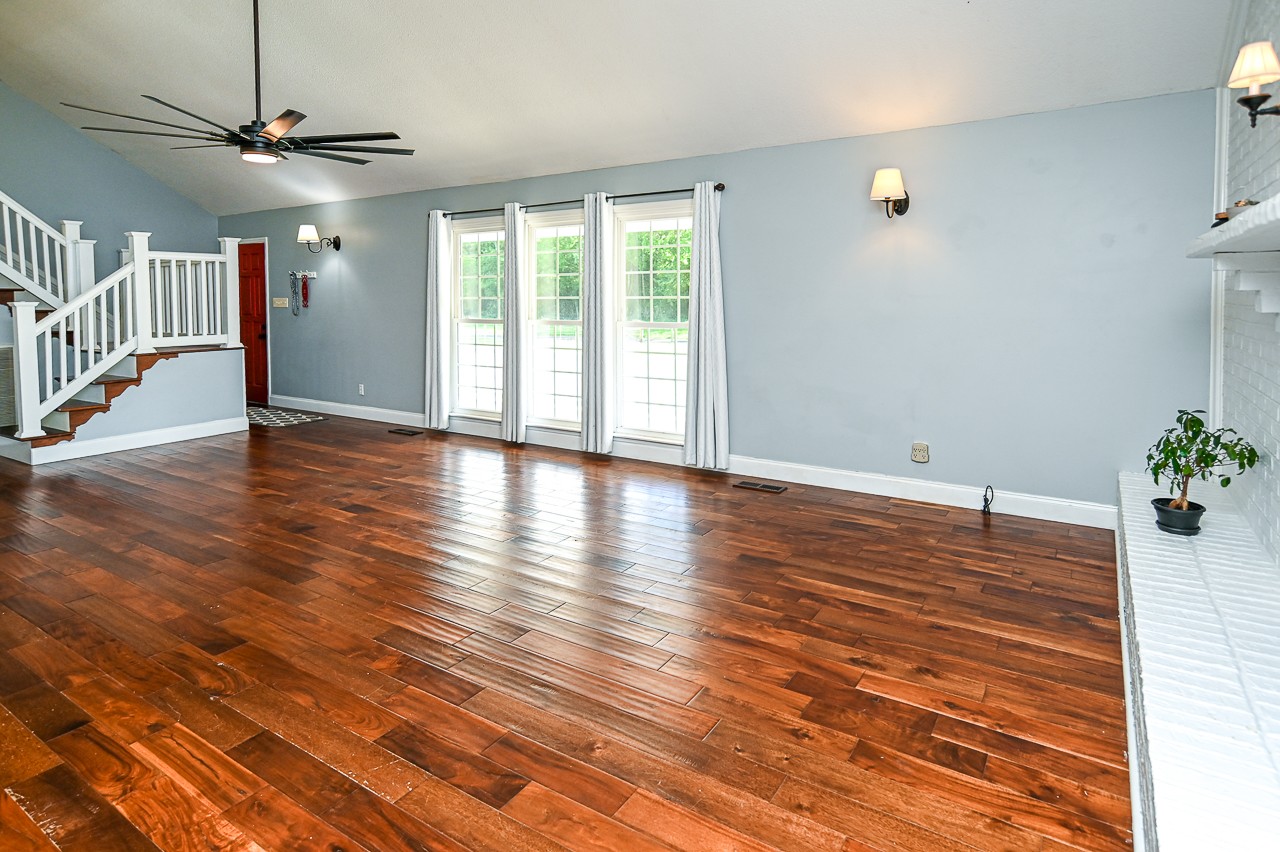 183 Lane Branch Road Fayetteville, TN 37334 - Photo 27 of 48 a view of an empty room with wooden floor and a window