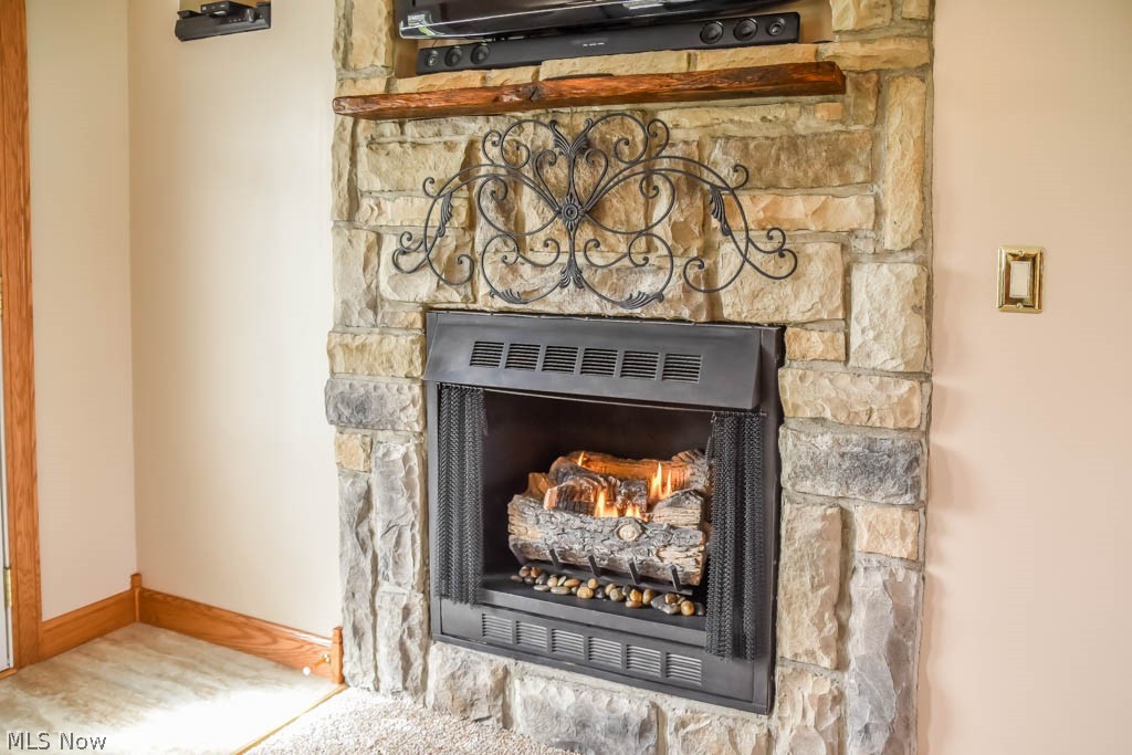 2651 Killian Road Uniontown, OH 44685 - Photo 11 of 25 Great room fireplace.