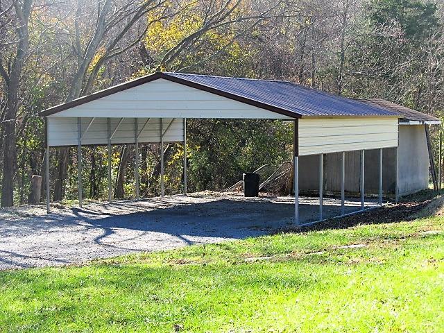 625 Coop Road Bell Buckle, TN 37020 - Photo 16 of 27 The carport is only a few months old.