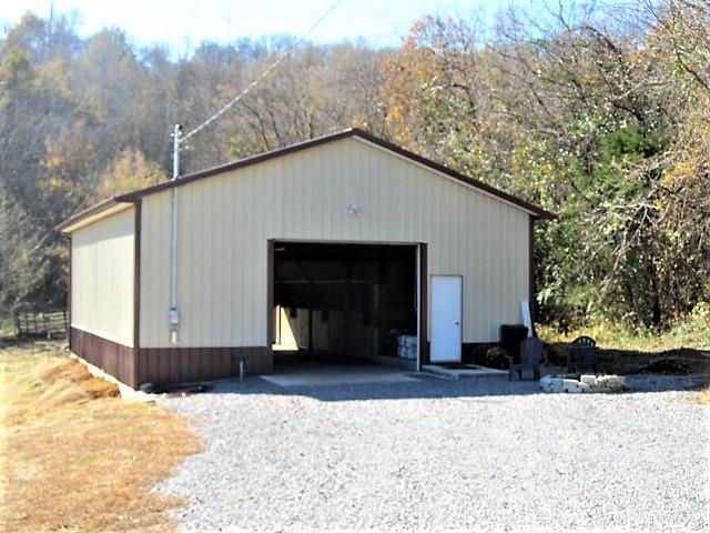 625 Coop Road Bell Buckle, TN 37020 - Photo 18 of 27 The horse barn is new and features three stalls, a tack room, and an entertainment area.