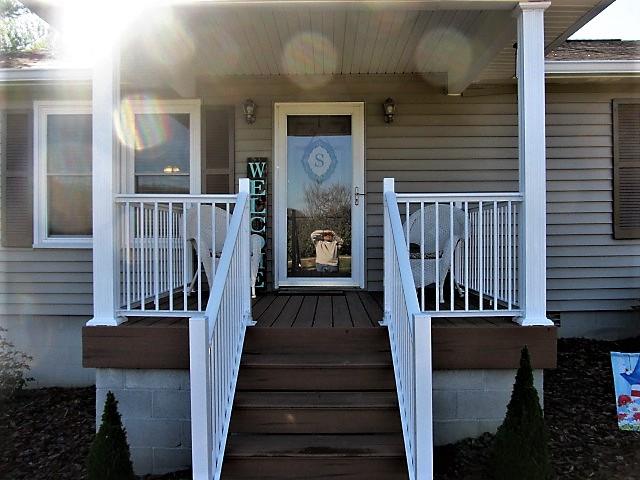 625 Coop Road Bell Buckle, TN 37020 - Photo 3 of 27 The new porch is floored with composite deck boards for years of carefree service.