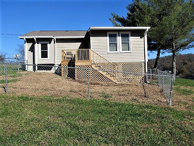 625 Coop Road Bell Buckle, TN 37020 - Photo 4 of 27 The rear deck is new, and the back yard is fenced.