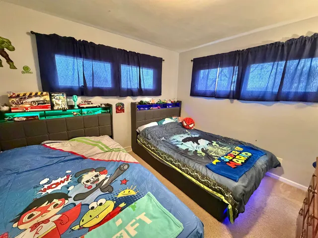 a room with furniture and a wooden floor