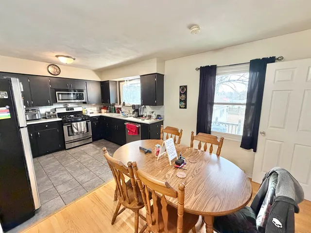 a view of a dining room with furniture