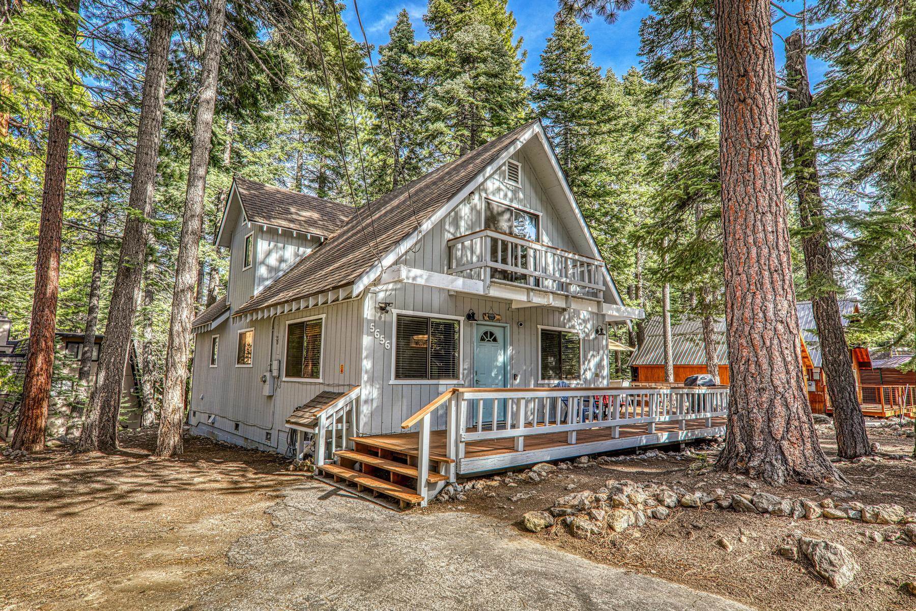 5656 Victoria Road Carnelian Bay, CA 96140 - Photo 26 of 28 a view of house with a yard