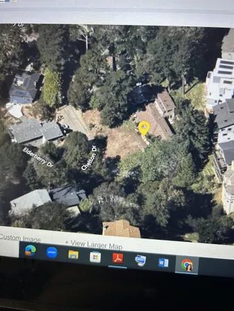 a view of lot of trees and houses
