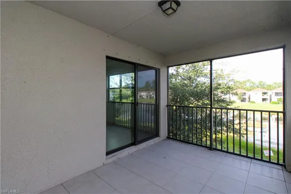 a view of a room with sliding glass door