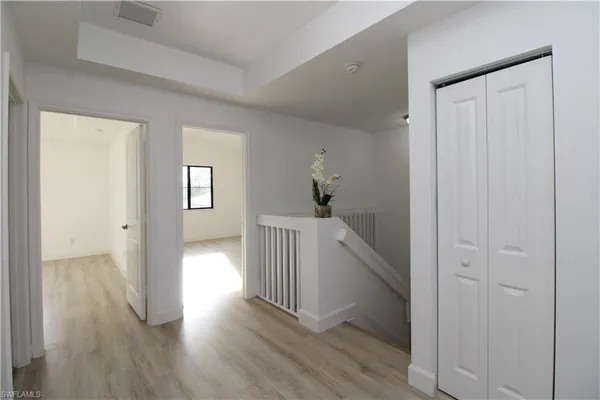 a view of entryway with wooden floor