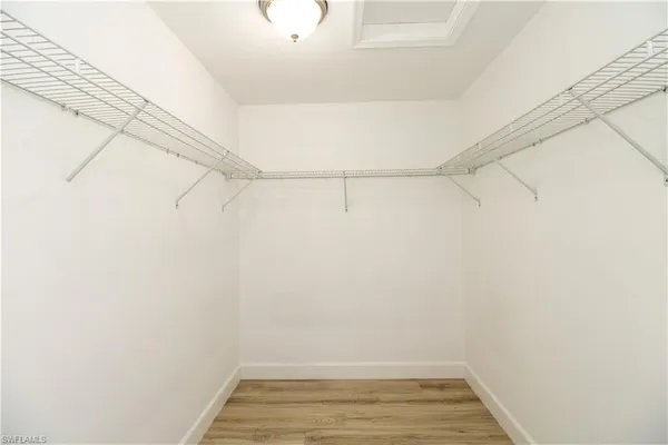 a view of a room with racks on the wall