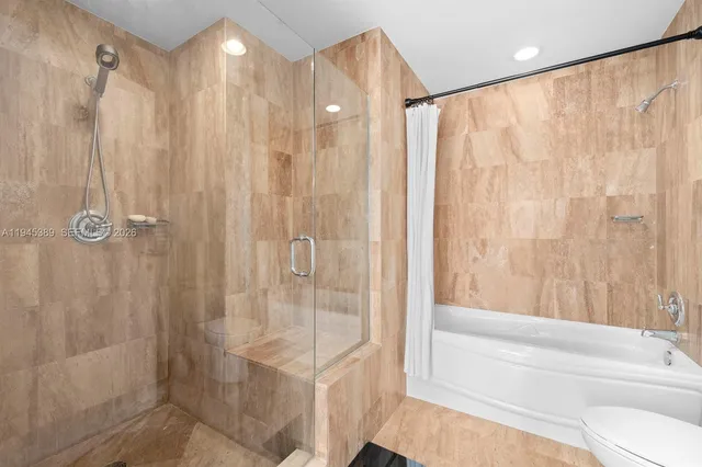 a view of a balcony with a floor to ceiling window and wooden floor