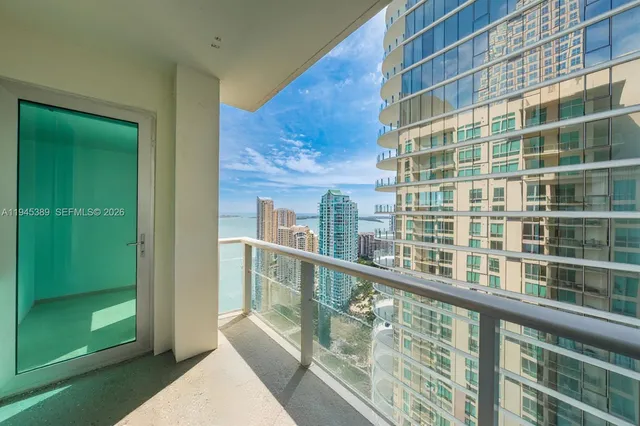 a view of a balcony with city view