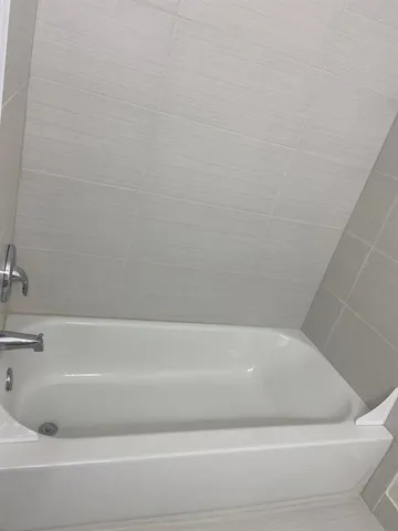 a bathroom with a bathtub
