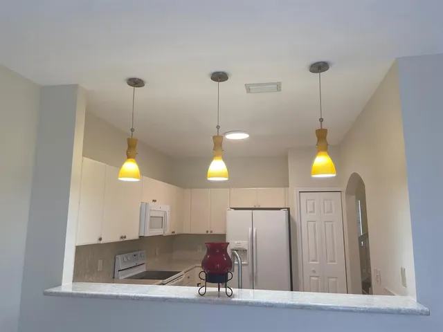 a view of a living room a chandelier