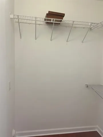 a view of a room with racks on the wall