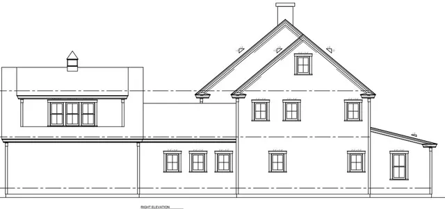 a view of a house with large windows