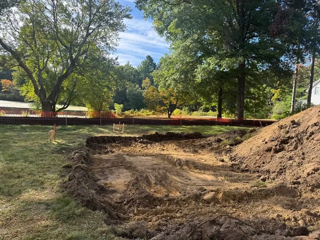 a view of a backyard of the house