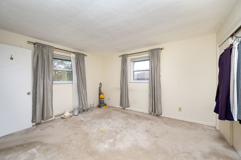 324 Beckenham Road Englewood, OH 45322 - Photo 16 of 26 This spacious bedroom offers ample natural light and a generous layout for personalized design.