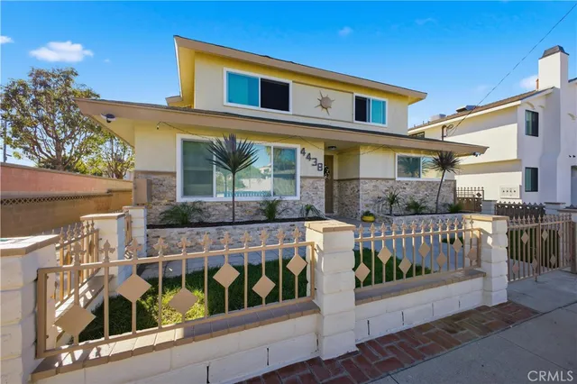 a front view of a house with balcony