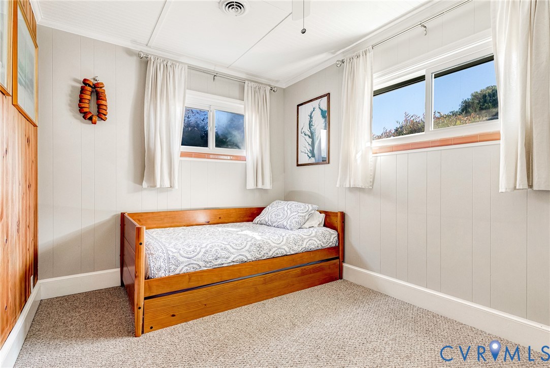 700 West Riverside Drive Lanexa, VA 23089 - Photo 13 of 44 a bedroom with a bed and window