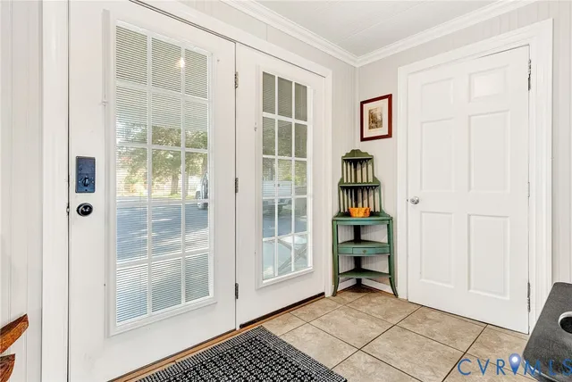 a view of an entryway with front door