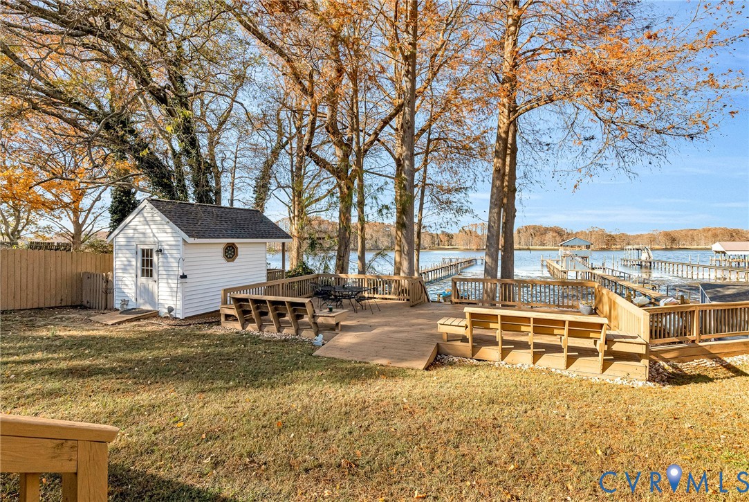 700 West Riverside Drive Lanexa, VA 23089 - Photo 36 of 44 a view of a house with backyard and sitting area