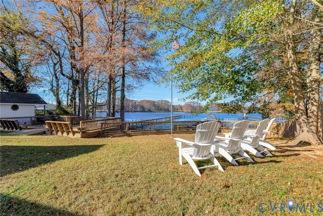a view of a swimming pool with lounge chairs
