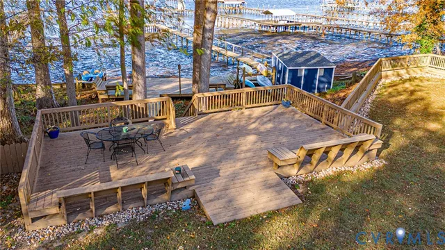 a view of a patio with iron fence