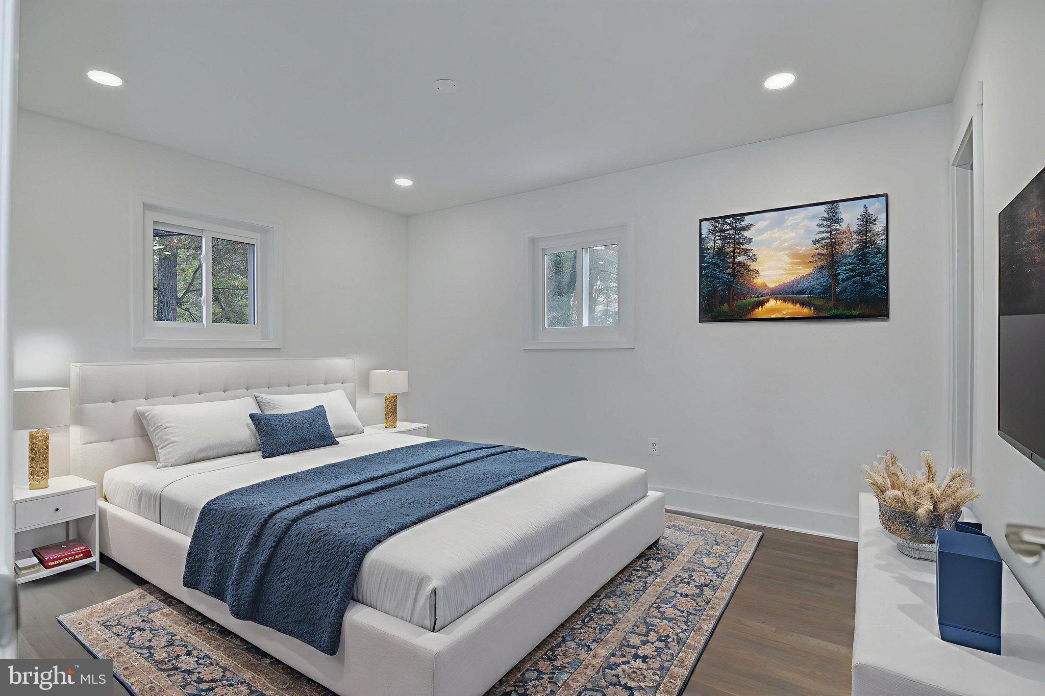 2016 Spring Grove Drive Accokeek, MD 20607 - Photo 17 of 36 a bedroom with a large bed and a couch