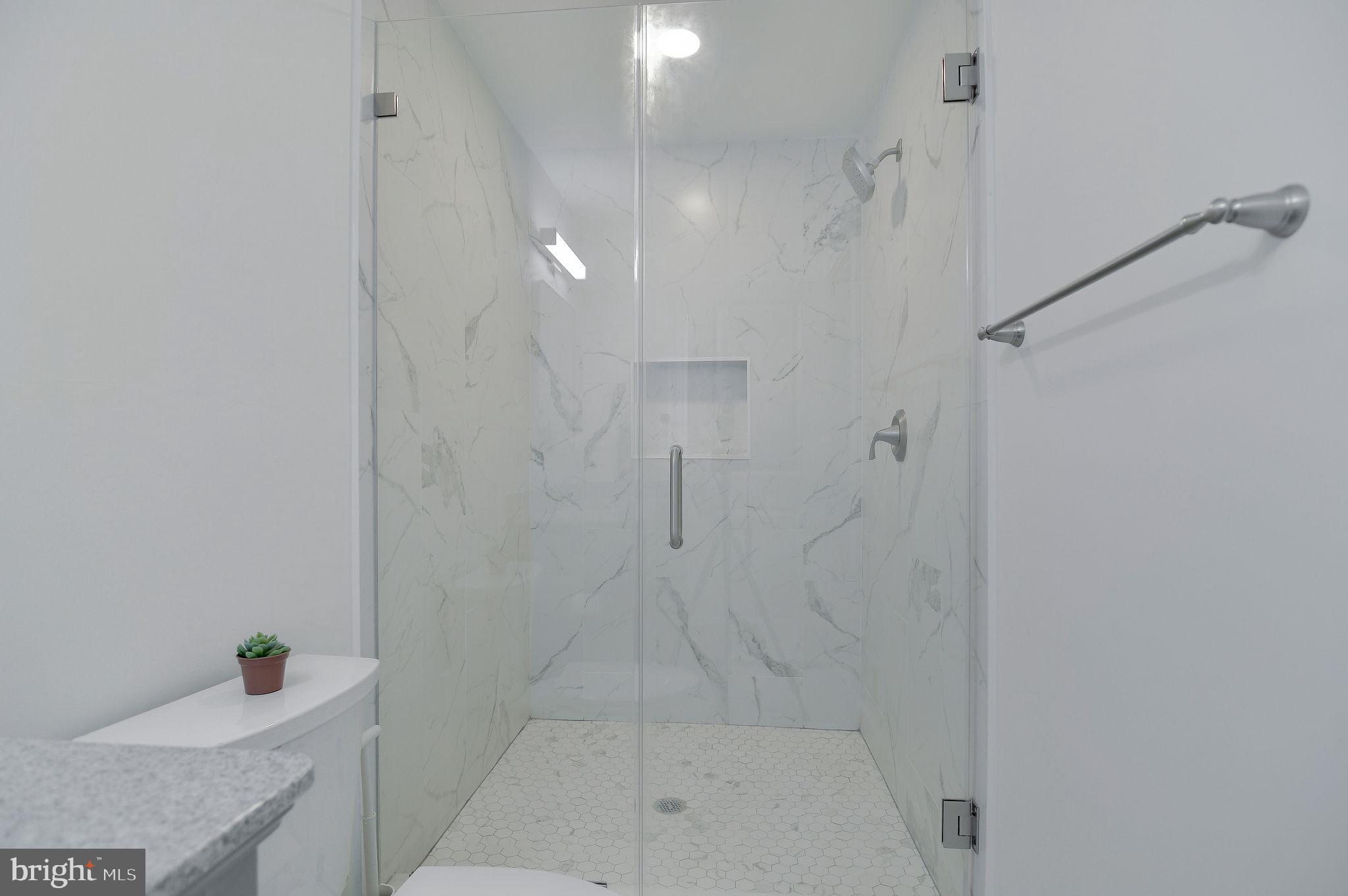 2016 Spring Grove Drive Accokeek, MD 20607 - Photo 19 of 36 a bathroom with a shower