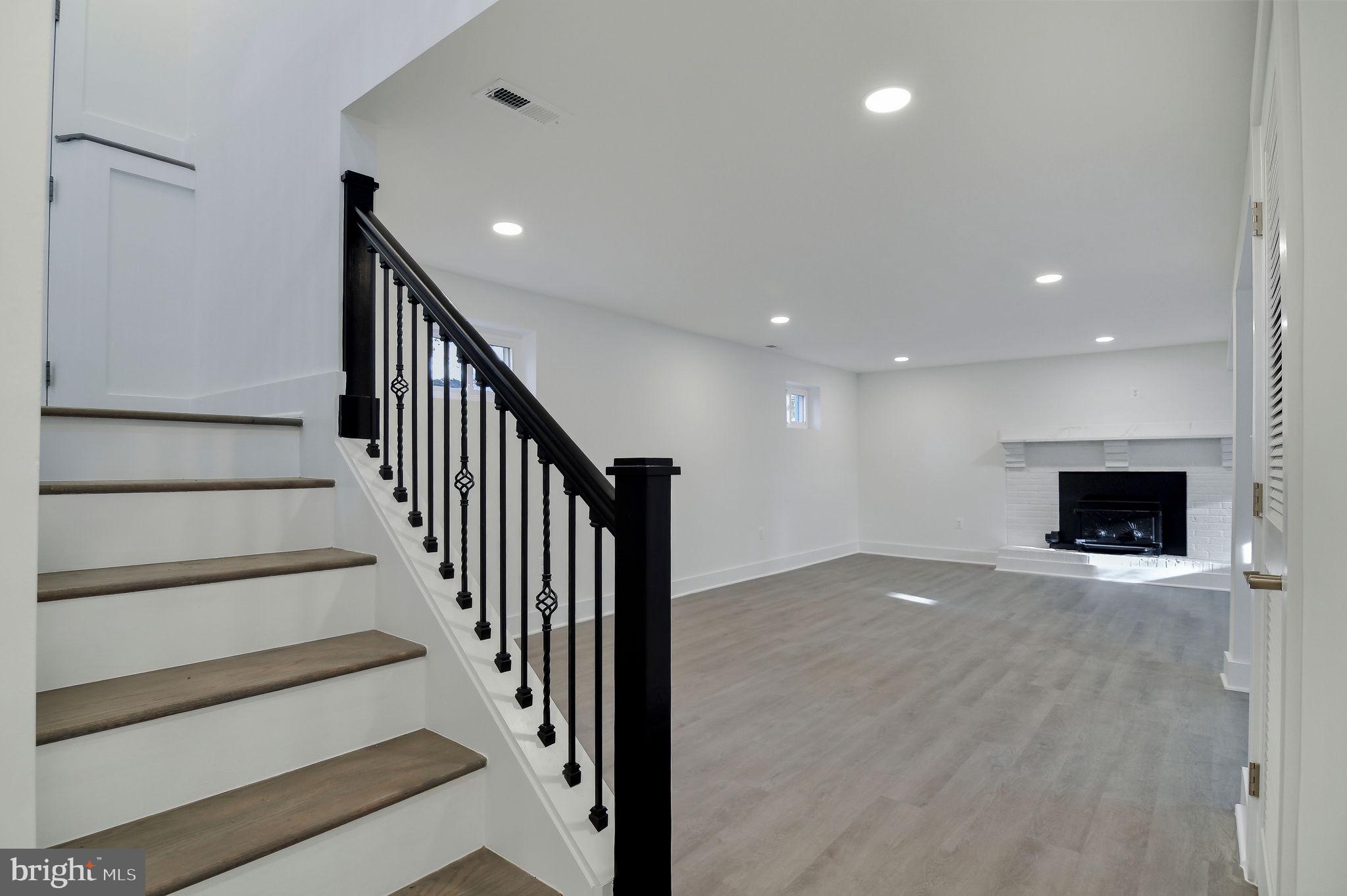 2016 Spring Grove Drive Accokeek, MD 20607 - Photo 20 of 36 a view of an empty room with wooden floor and a fireplace