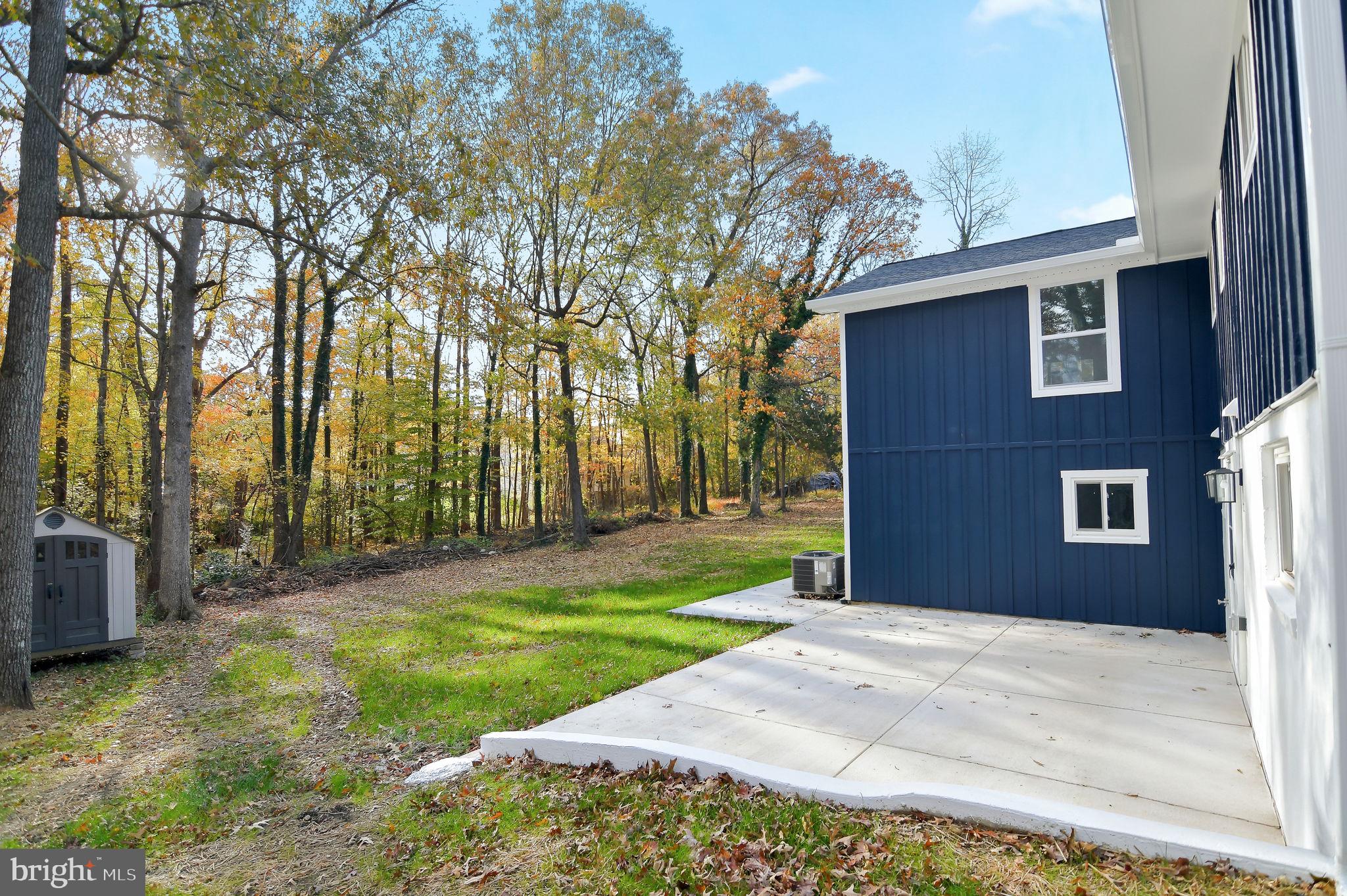 2016 Spring Grove Drive Accokeek, MD 20607 - Photo 28 of 36 a backyard of a house with yard and outdoor seating