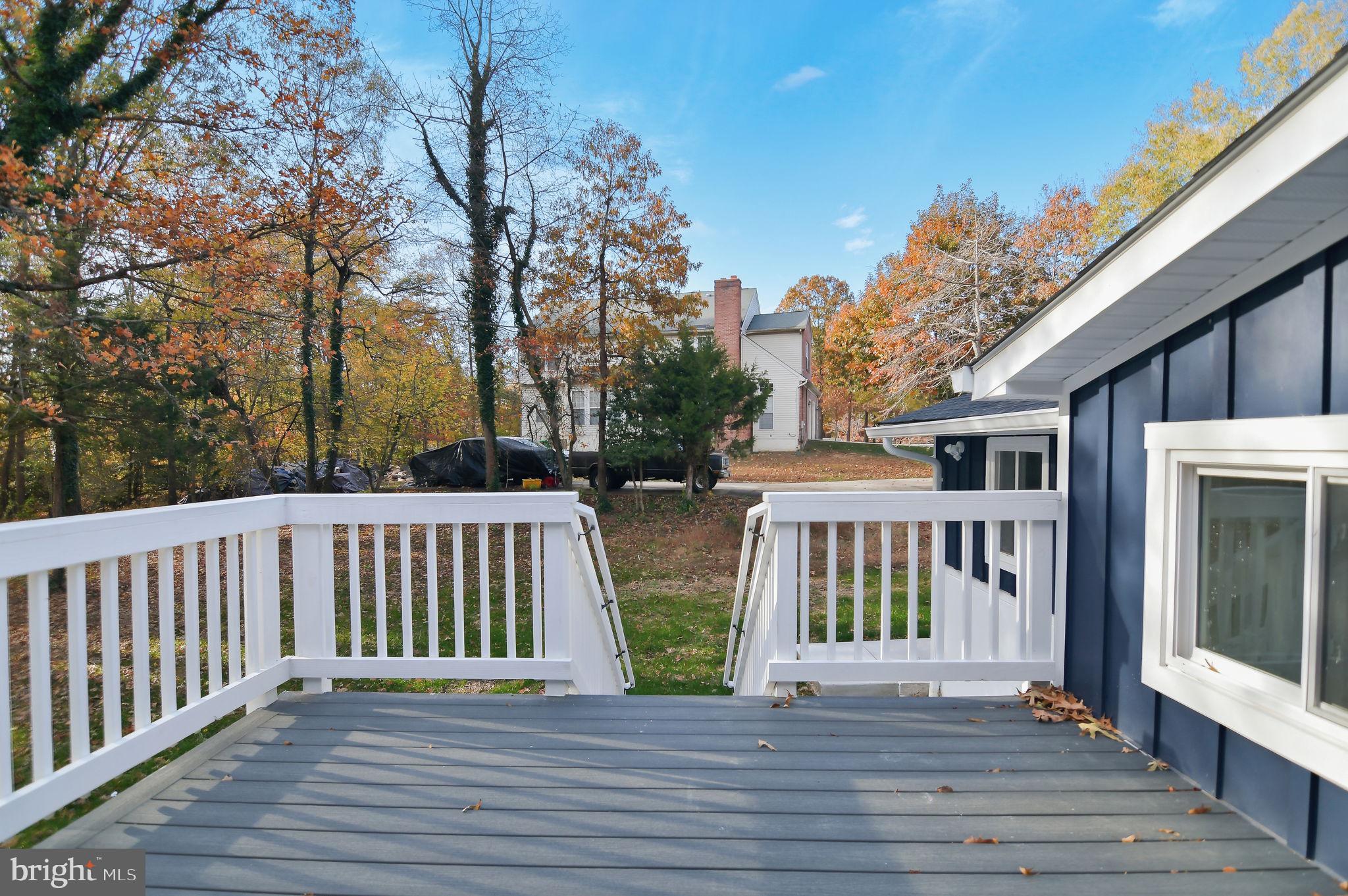 2016 Spring Grove Drive Accokeek, MD 20607 - Photo 35 of 36 a view of a brick house with wooden floor windows
