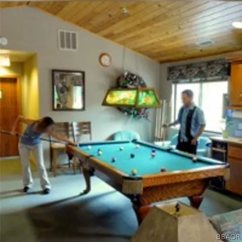 a room with table and chairs