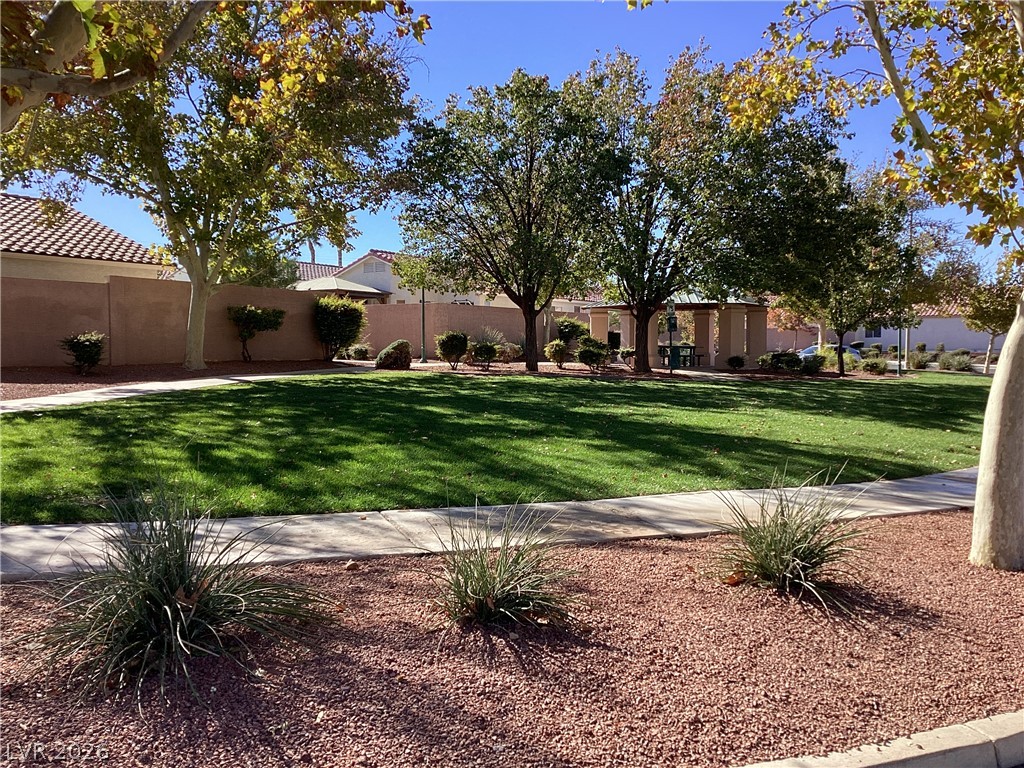 2135 Hidden Ranch Terrace Henderson, NV 89052 - Photo 26 of 27 A well-maintained community park offers a verdant lawn and covered picnic area.