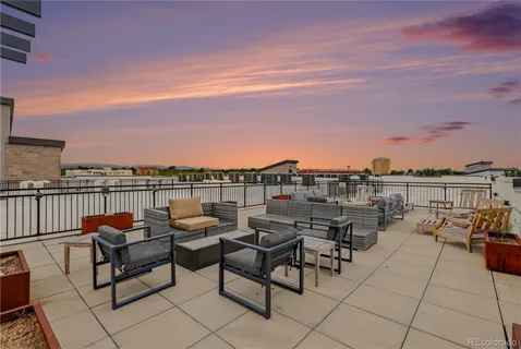 a view of a terrace with furniture