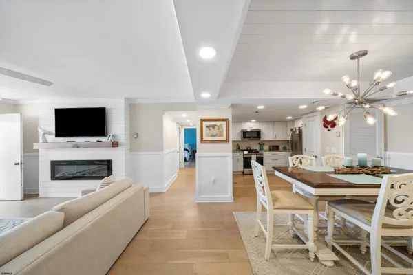 a view of a dining room kitchen and a fireplace
