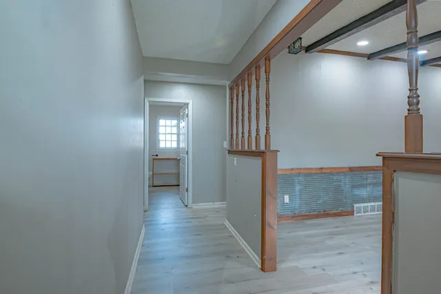 a view of hallway with stairs