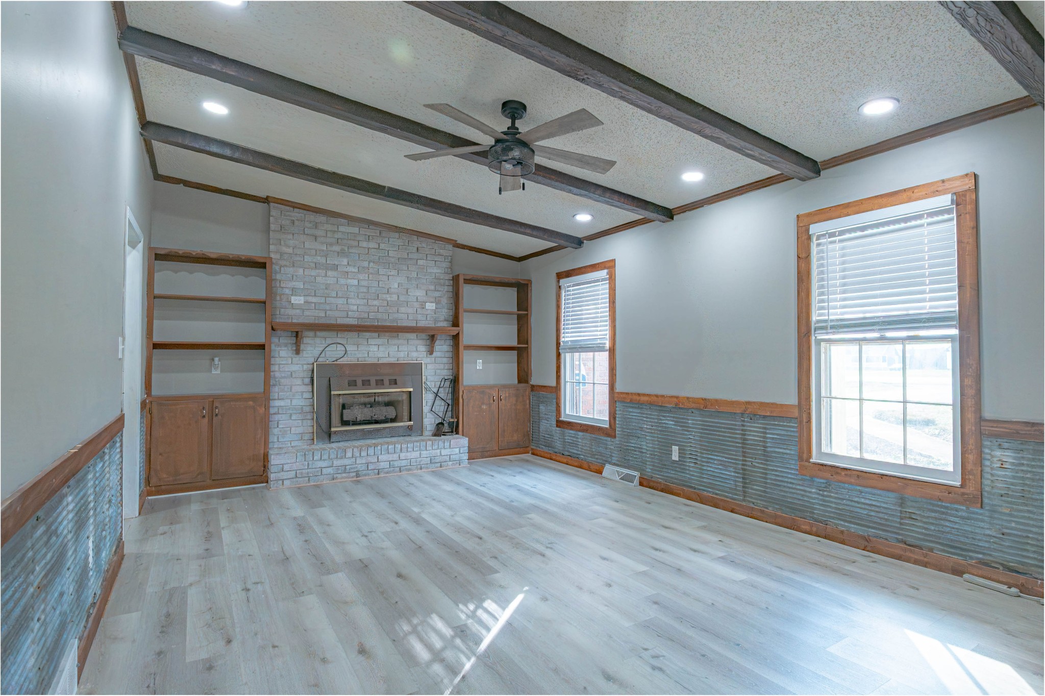 674 Girkin Road Bowling Green, KY 42101 - Photo 15 of 50 a view of an empty room with a fireplace and a window