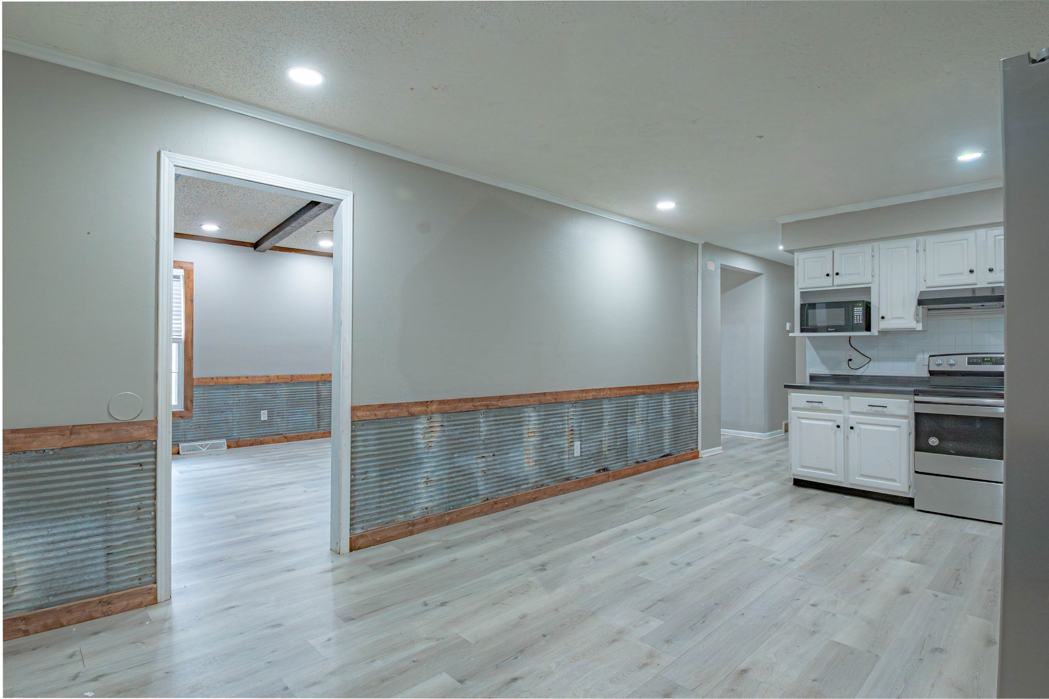 674 Girkin Road Bowling Green, KY 42101 - Photo 20 of 50 a view of a kitchen with a sink and a stove top oven