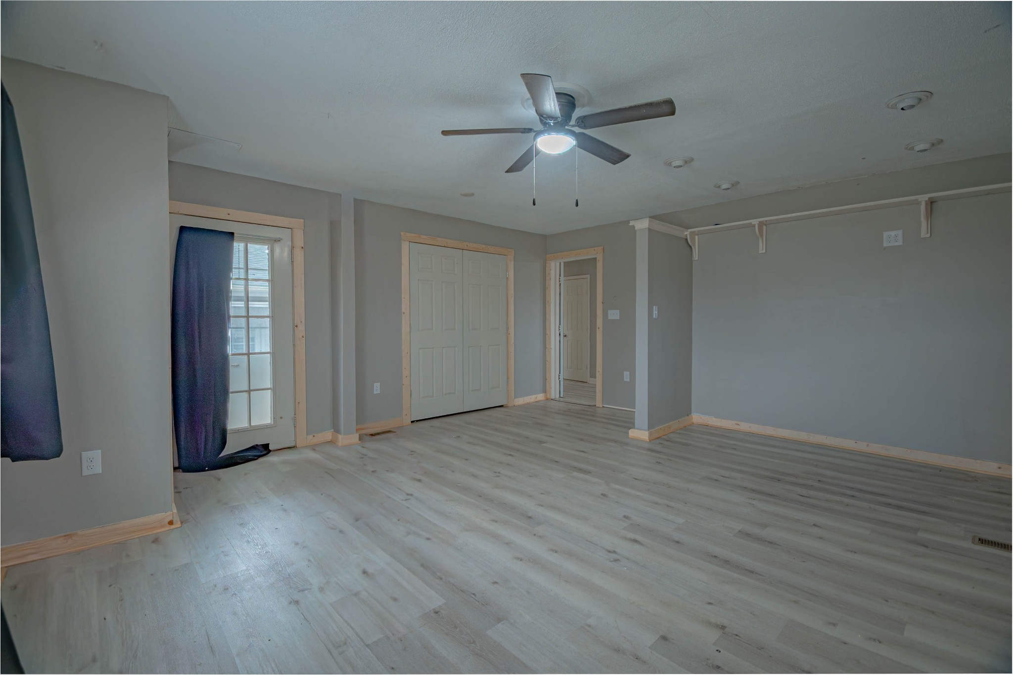 674 Girkin Road Bowling Green, KY 42101 - Photo 35 of 50 an empty room with wooden floor fan and windows