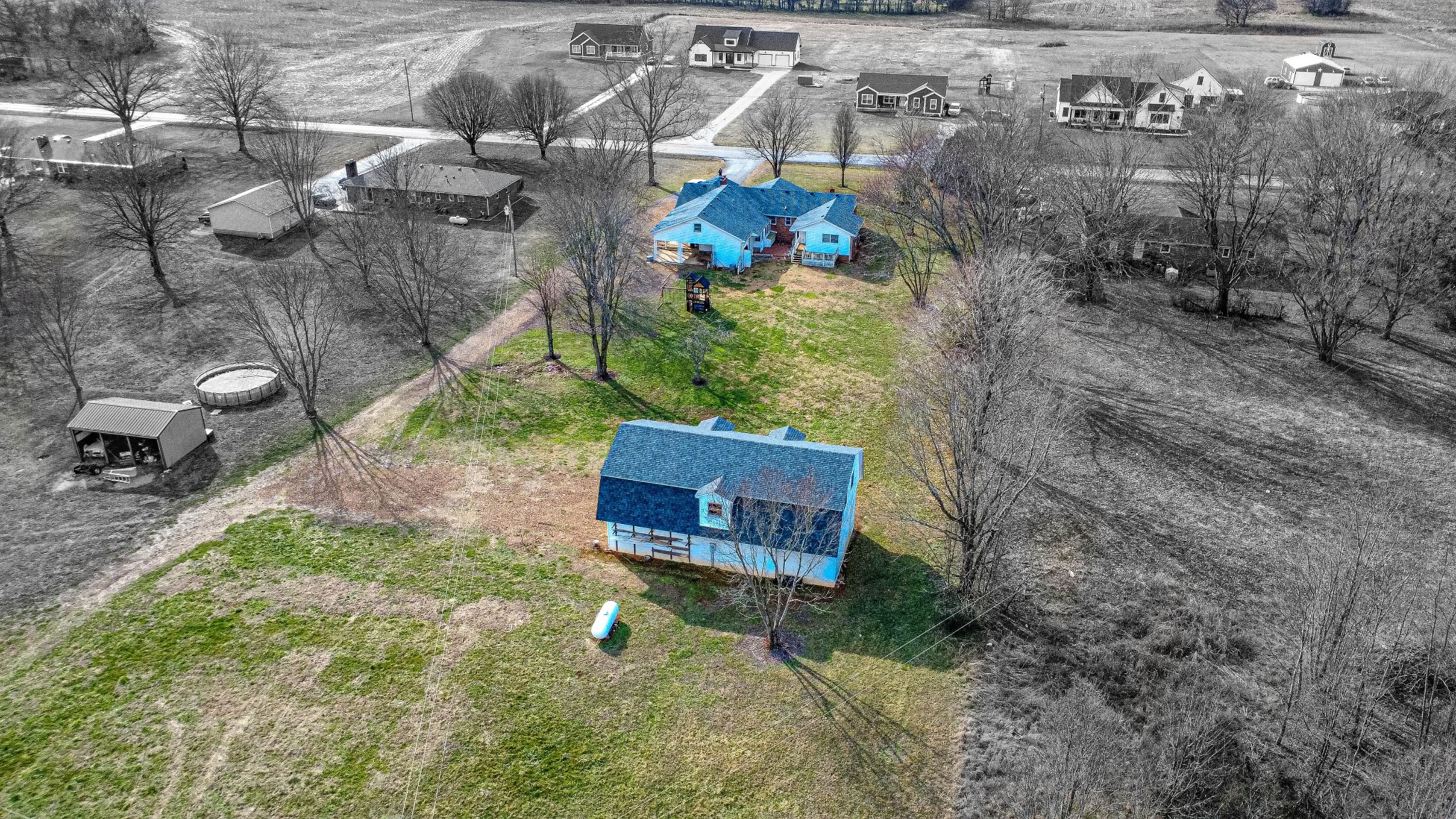 674 Girkin Road Bowling Green, KY 42101 - Photo 50 of 50 a backyard of a house with outdoor seating