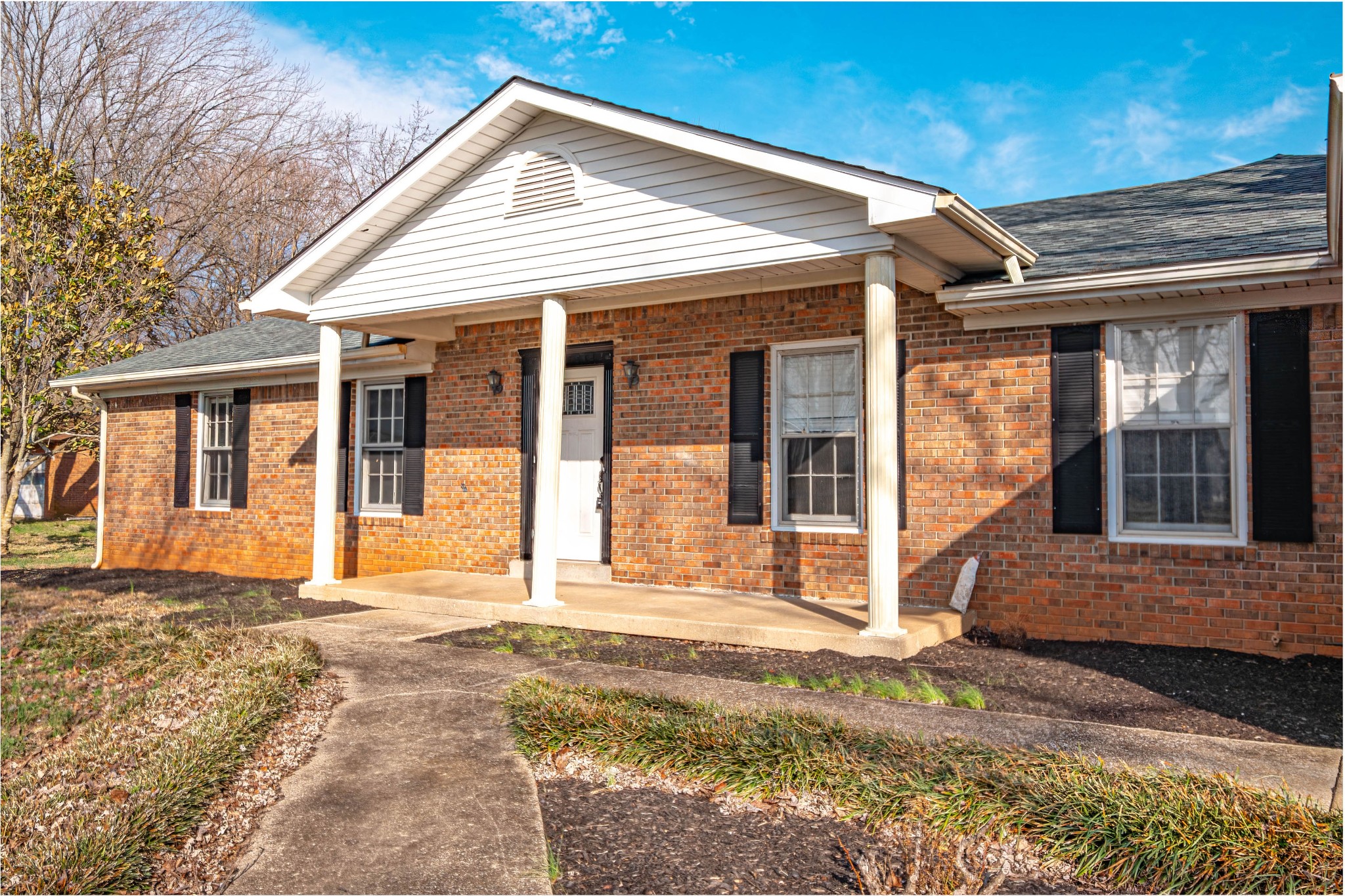 674 Girkin Road Bowling Green, KY 42101 - Photo 5 of 50 a backyard of a house with yard and outdoor seating