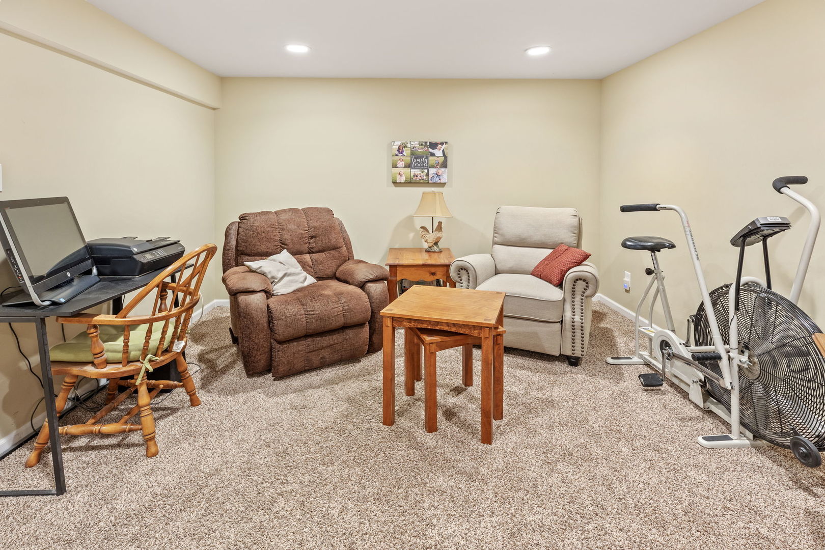 600 Stonegate Road New Lenox, IL 60451 - Photo 19 of 23 a living room with furniture and a flat screen tv
